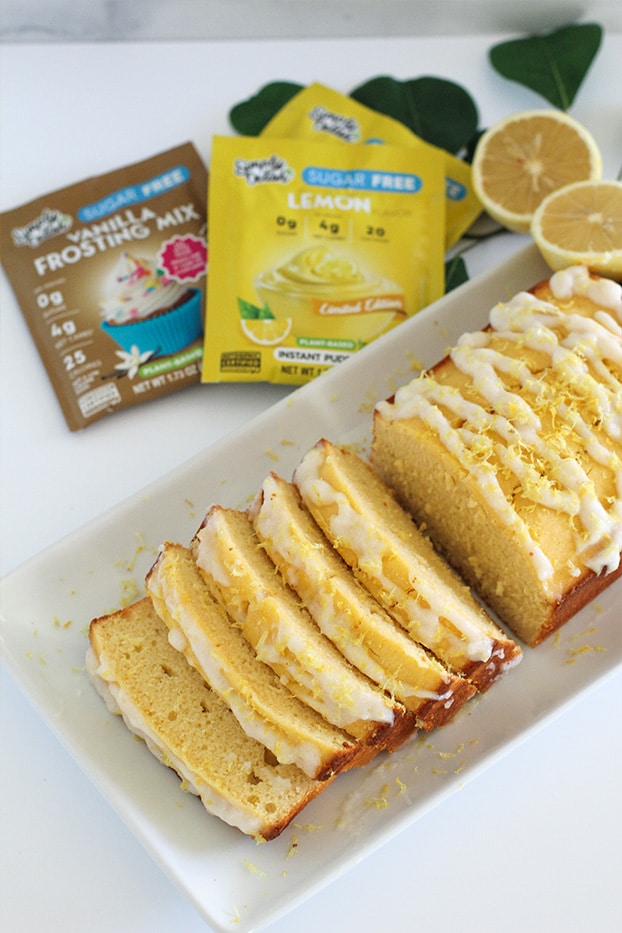 Keto Lemon Pudding Loaf side view with Simply Delish Lemon Pudding and Vanilla Frosting Mix