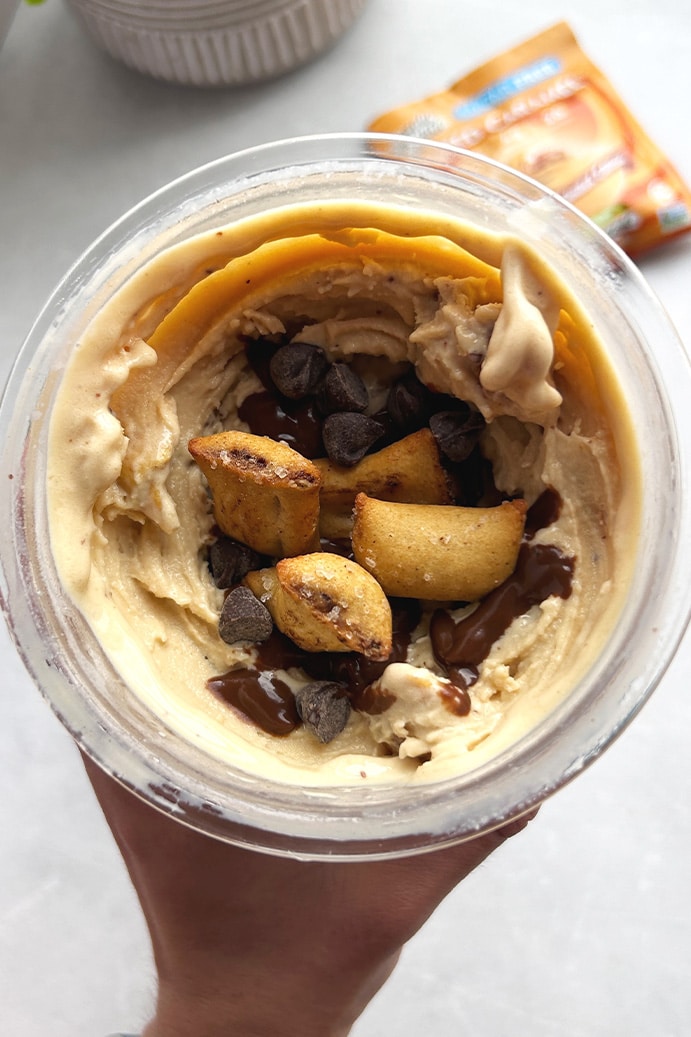 Dark Chocolate Pretzel Caramel Protein Ice Cream top view close up