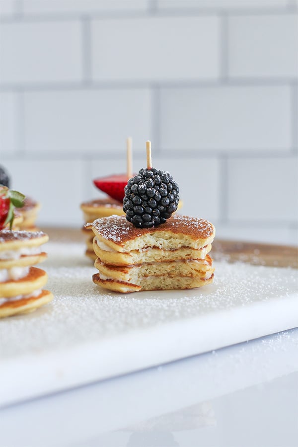 Vanilla Frosting Maple Butter Pancake Bites front view with berry